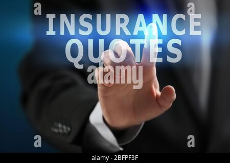 Insurance quotes concept. Man working with virtual screen Stock Photo