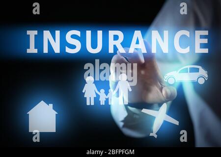 Insurance concept. Businessman working with virtual screen, closeup Stock Photo