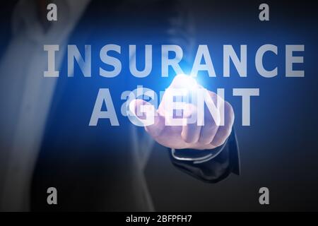 Insurance agent concept. Businessman working with virtual screen, closeup Stock Photo