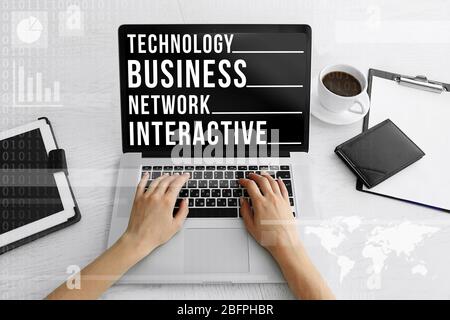 Modern technology and business concept. Woman using laptop, closeup Stock Photo