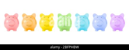 Colorful piggy banks on white background. Money savings concept Stock Photo