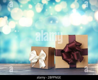 Christmas gifts on blurred light background Stock Photo