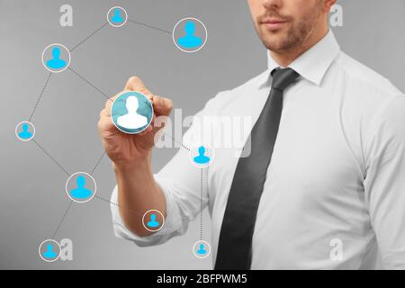 Man working with virtual screen, closeup. Concept of human resources management Stock Photo