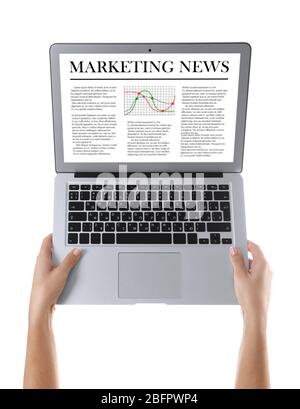 Woman holding laptop on white background. Marketing news on screen Stock Photo