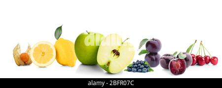 Collage of different fruits and berries on white background Stock Photo