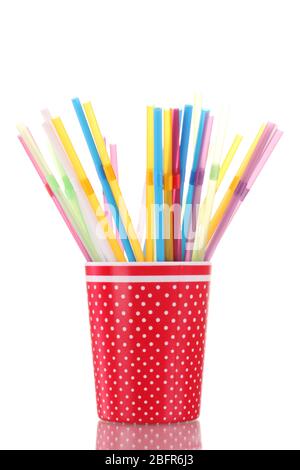 red glass with straws isolated on white Stock Photo