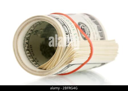 A lot of one hundred dollar bills tied rubber band isolated on white Stock Photo