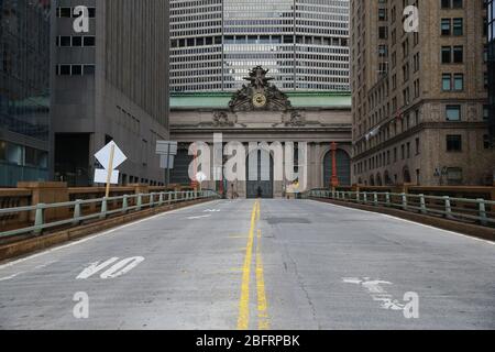 New York, N.Y/USA – 20th April 2020: The roadway on Park Avenue ar Grand Central Terminal is nearly empty of traffic due to health concerns. Stock Photo