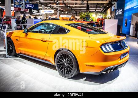 Brussels, Belgium, Jan 09, 2020: metallic yellow Ford Mustang GT at Brussels Motor Show Stock Photo