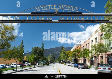 Sign for Old Town Monrovia, California above Myrtle Avenue and leading into the downtown shopping district Stock Photo