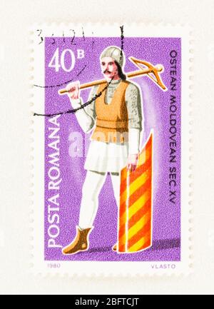 SEATTLE WASHINGTON - April 18, 2020: Close up of Romanian Stamp, featuring 15th century Moldavian military man in uniform. Scott 2978 Stock Photo