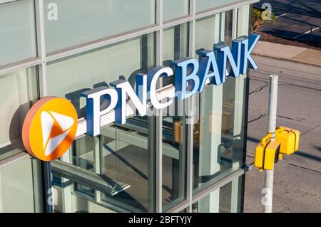 The PNC bank logo on the side of a building, PNC is a Pittsburgh area bank which first began business in 1852, Pittsburgh, Pennsylvania, USA Stock Photo