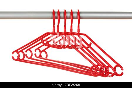 plastic hangers in row  isolated on white Stock Photo