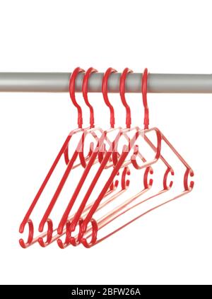 plastic hangers in row  isolated on white Stock Photo