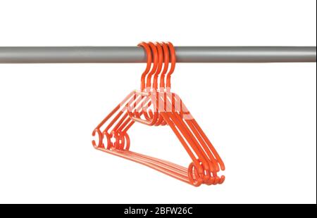 plastic hangers in row  isolated on white Stock Photo