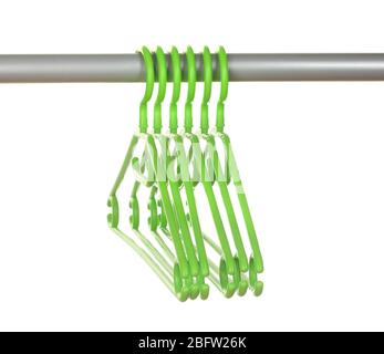 plastic hangers in row  isolated on white Stock Photo