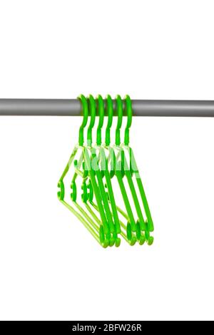 plastic hangers in row  isolated on white Stock Photo