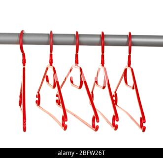 plastic hangers in row  isolated on white Stock Photo