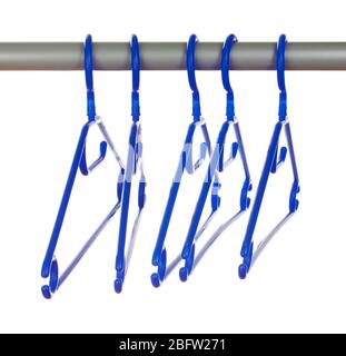 plastic hangers in row  isolated on white Stock Photo