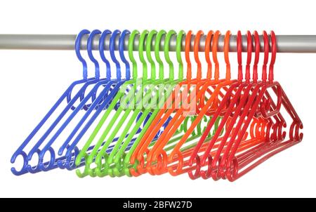 plastic hangers in row  isolated on white Stock Photo