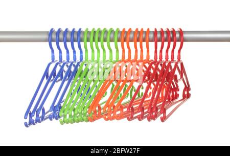 plastic hangers in row  isolated on white Stock Photo