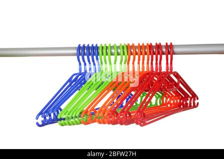 plastic hangers in row  isolated on white Stock Photo