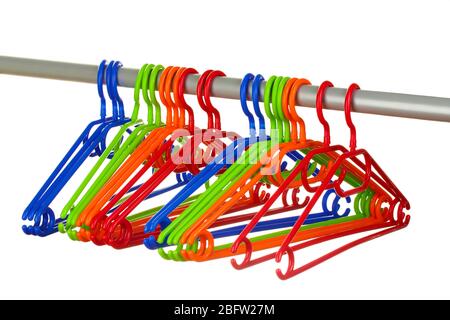 plastic hangers in row  isolated on white Stock Photo