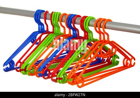 plastic hangers in row  isolated on white Stock Photo