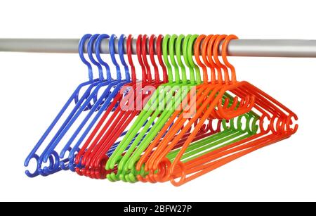 plastic hangers in row  isolated on white Stock Photo