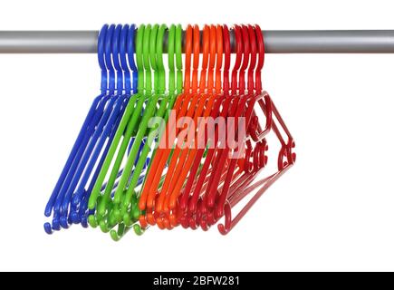 plastic hangers in row  isolated on white Stock Photo