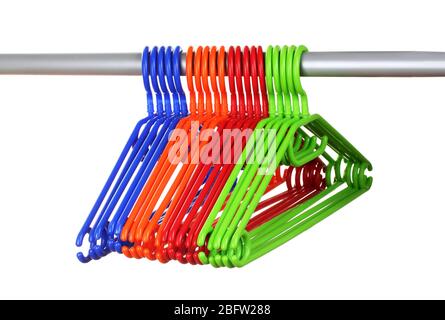 plastic hangers in row  isolated on white Stock Photo