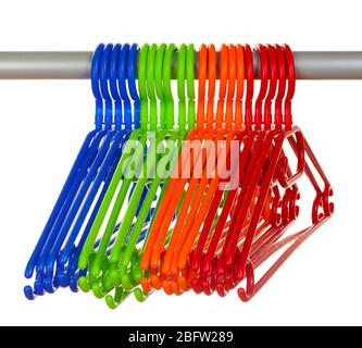 plastic hangers in row  isolated on white Stock Photo