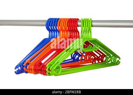 plastic hangers in row  isolated on white Stock Photo