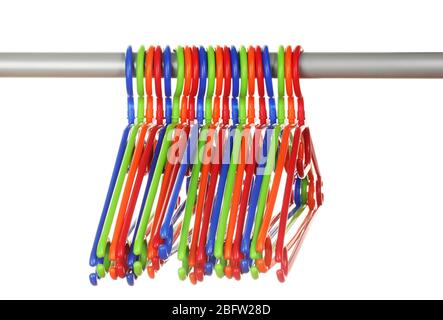 plastic hangers in row  isolated on white Stock Photo