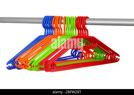 plastic hangers in row  isolated on white Stock Photo