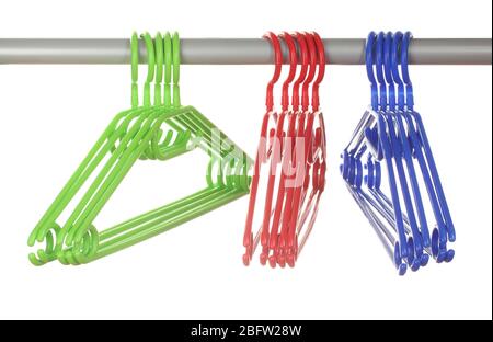 plastic hangers in row  isolated on white Stock Photo