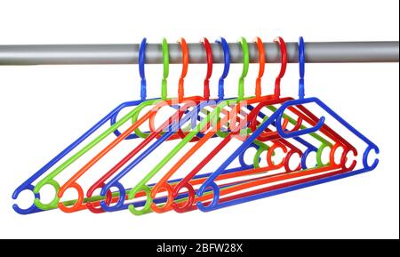 plastic hangers in row  isolated on white Stock Photo