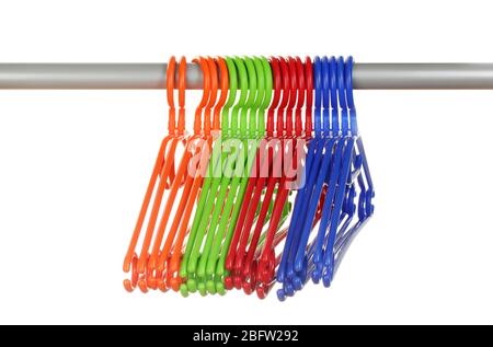 plastic hangers in row  isolated on white Stock Photo