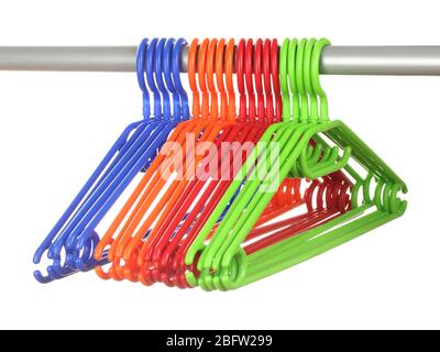 plastic hangers in row  isolated on white Stock Photo