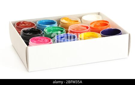 jars with colorful gouache in paper box isolated on white background Stock Photo