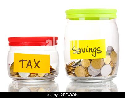 Glass banks for tips with money isolated on white Stock Photo