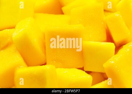 Tropical fruit, Mango cube slices background. Stock Photo