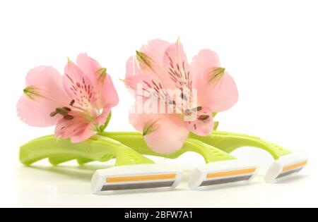 woman safety shavers and flowers isolated on white Stock Photo