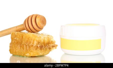 Jar of cream with honey isolated on white Stock Photo