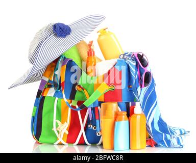 Beach bag with beach accessories, isolated on white Stock Photo