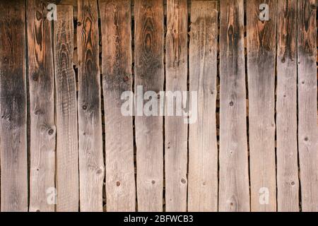 Wall, fence from old rural wooden boards, background and texture. Stock Photo