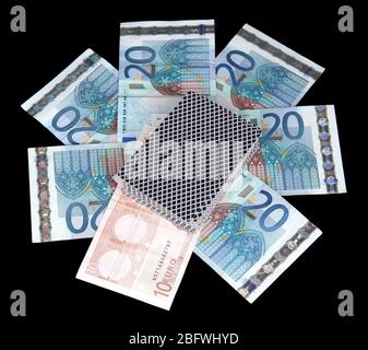 Euro and a deck of playing cards isolated on black Stock Photo