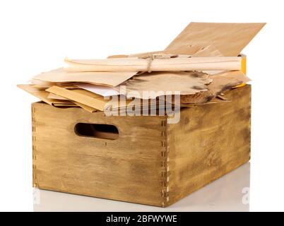 Wooden crate with papers and letters isolated on white Stock Photo