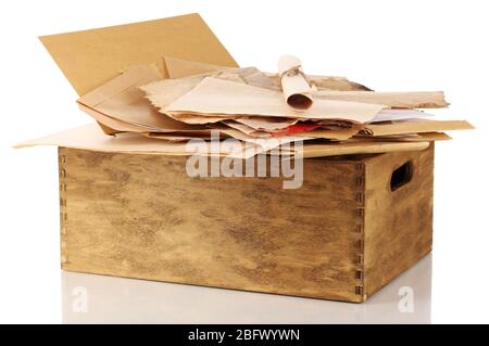 Wooden crate with papers and letters isolated on white Stock Photo