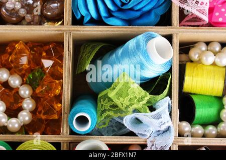 thread and material for handicrafts in box close-up Stock Photo